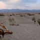 Visitors walk along sand dunes at sunset inside Death Valley National Park on June 17, 2021, in Inyo County, California.